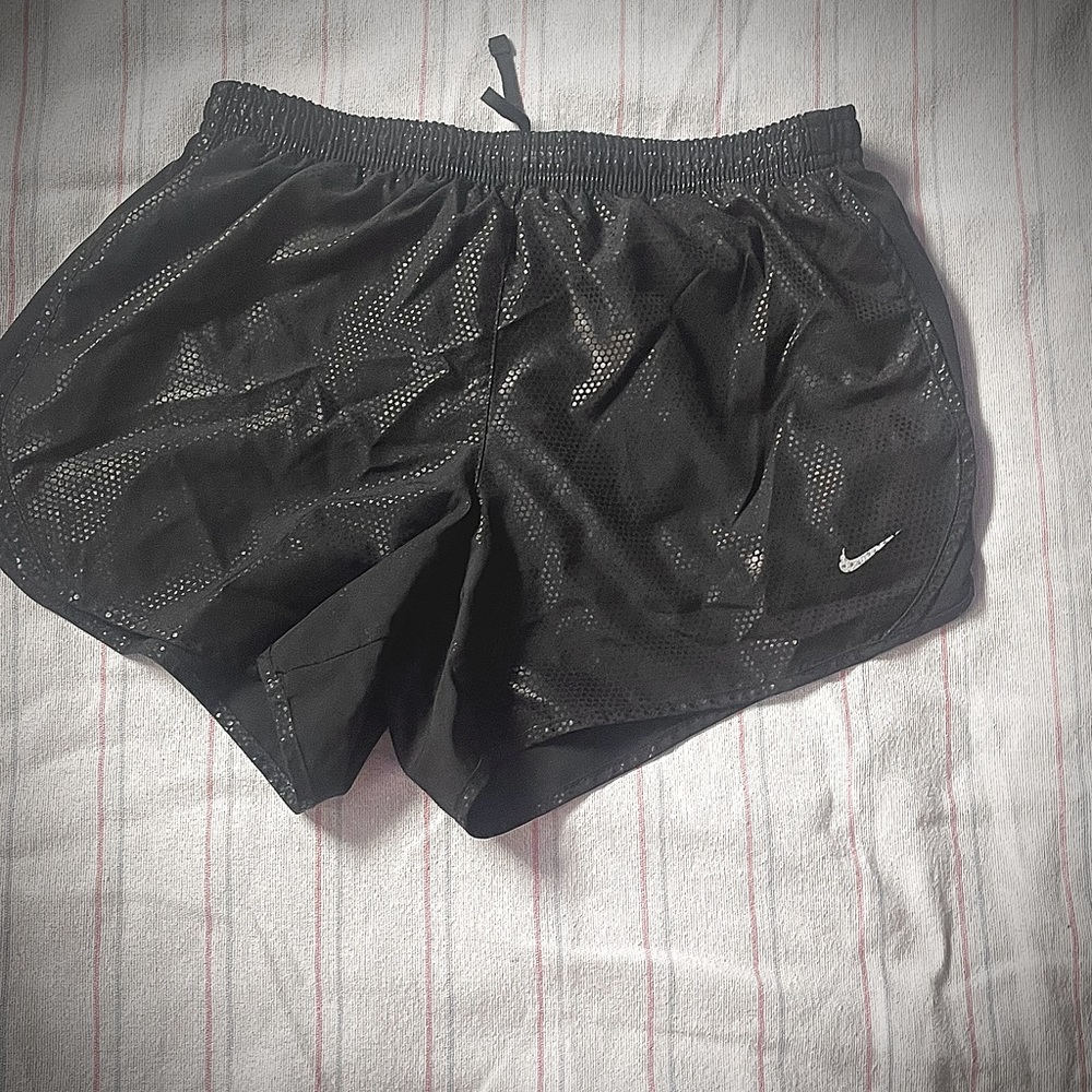 Black nike shorts kids large.